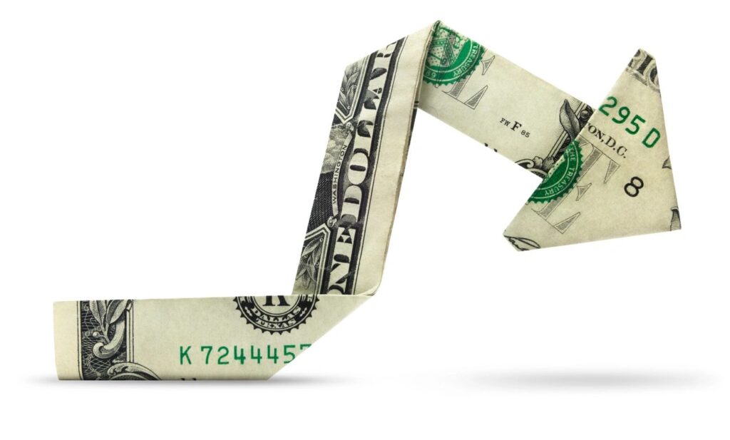 A one-dollar bill folded into the shape of a high-heeled shoe.
