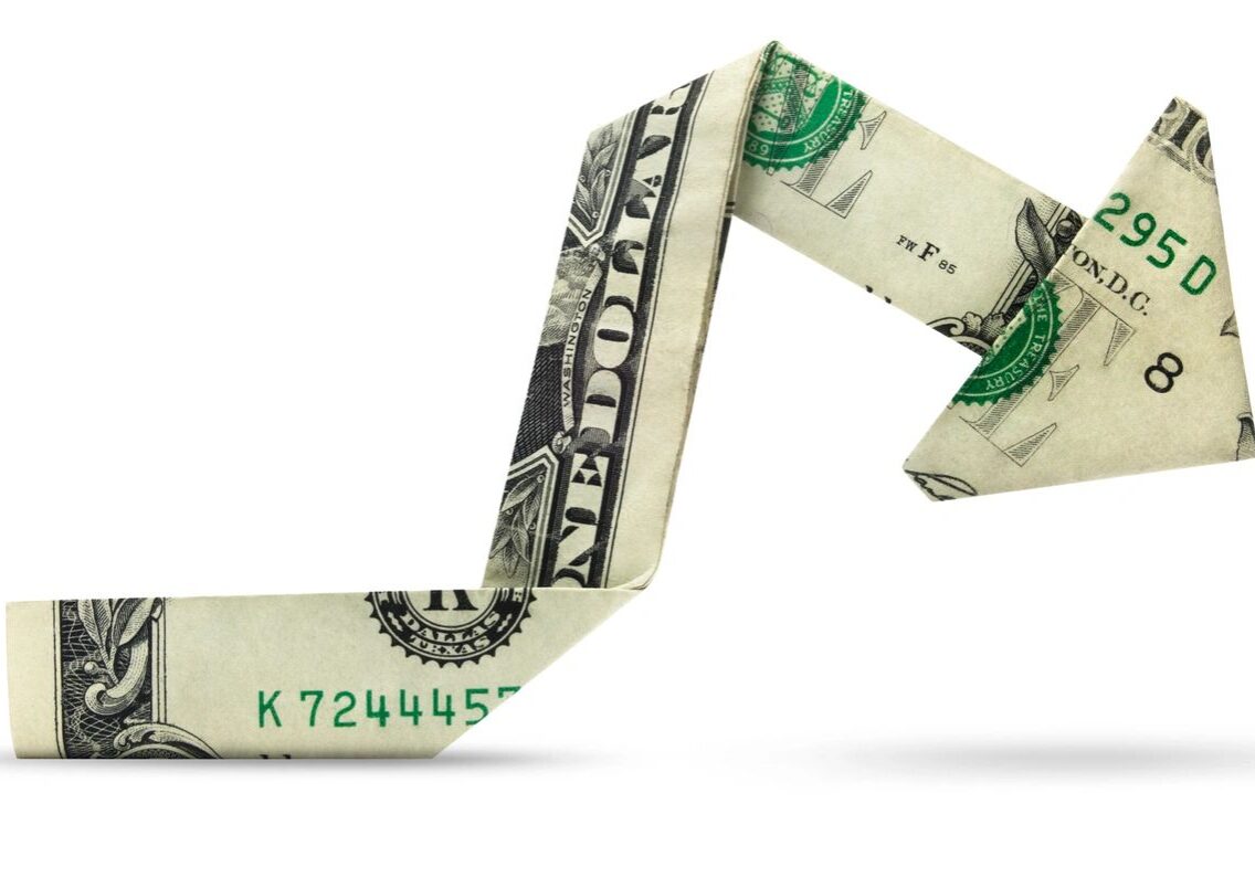 A one-dollar bill folded into the shape of a high-heeled shoe.